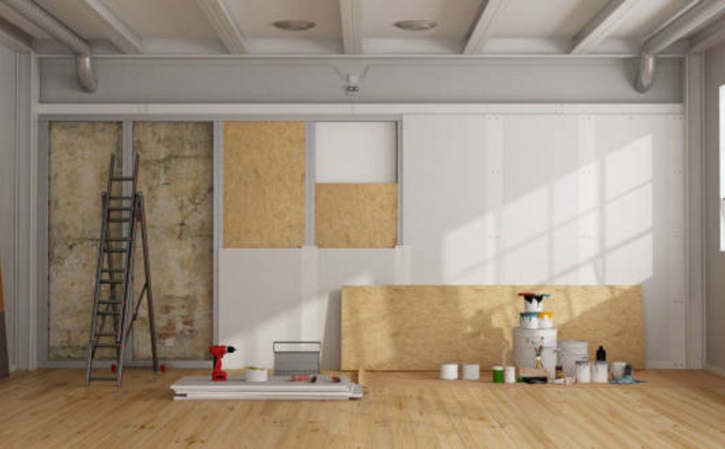 Interior view of old wall undergoing insulation and restoration work
