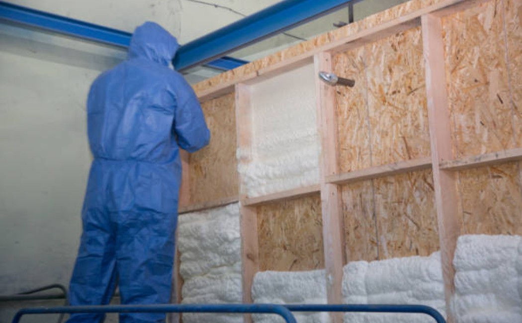 Professional insulating home walls with spray foam material